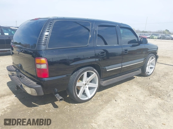 2003 Chevrolet Tahoe LT with VIN 1GNEC13Z73J322783, listed as a IAAI auction lot 41773868 with 259,710 mi miles and . Bid and sale history available at DreamBid. Image 4.