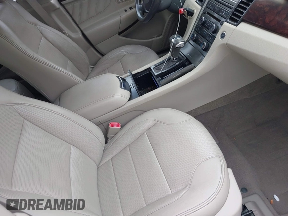 2010 Ford Taurus Limited with VIN 1FAHP2FW6AG144074, listed as a IAAI auction lot 41945777 with 135,096 mi miles. Bid and sale history available at carsss.com. Image 5.