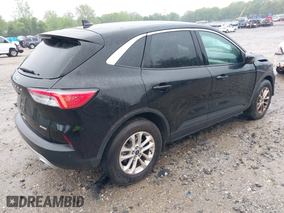 2021 Ford Escape SE with VIN 1FMCU9G67MUA23303, listed as a IAAI auction lot 42232319 with 12,694 mi miles and . Bid and sale history available at DreamBid. Image 4.