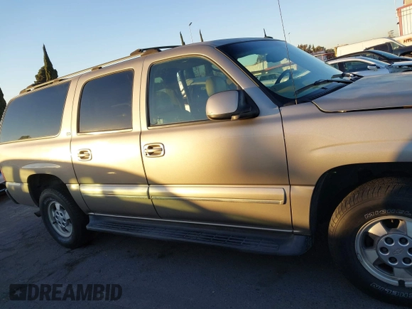 2003 Chevrolet Suburban LS with VIN 1GNEC16T43J269726, listed as a IAAI auction lot 41109855 with 122,820 mi miles. Bid and sale history available at carsss.com. Image 13.