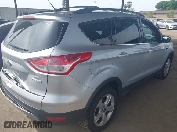 2013 Ford Escape SE with VIN 1FMCU0GX5DUB97293, listed as a IAAI auction lot 42044696 with 182,746 mi miles and . Bid and sale history available at DreamBid. Image 4.