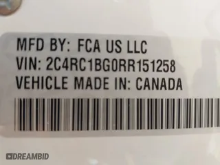 2024 Chrysler Pacifica Touring L with VIN 2C4RC1BG0RR151258, listed as a IAAI auction lot 42040280 with 35,919 mi miles. Bid and sale history available at carsss.com. Image 9.