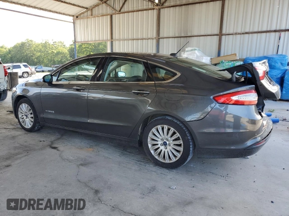 2015 Ford Fusion SE Hybrid with VIN 3FA6P0LU5FR218454, listed as a Copart auction lot 60682065 with 218,668 mi miles and Salvage title. Bid and sale history available at DreamBid. Image 2.