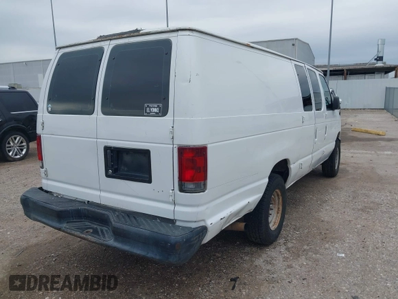 2008 Ford Econoline Cargo Commercial with VIN 1FTNS24L68DA24209, listed as a IAAI auction lot 41206100 with 211,288 mi miles and . Bid and sale history available at DreamBid. Image 4.