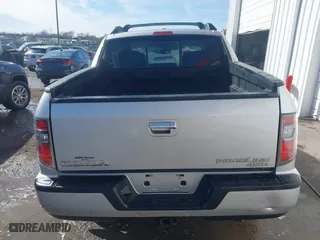 2014 Honda Ridgeline RTL with VIN 5FPYK1F51EB012843, listed as a IAAI auction lot 41629002 with 114,761 mi miles. Bid and sale history available at carsss.com. Image 16.