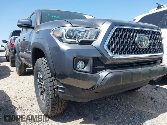 2018 Toyota Tacoma SR with VIN 5TFCZ5AN6JX127774, listed as a IAAI auction lot 41801158 with 28,161 mi miles and . Bid and sale history available at DreamBid. Image 18.