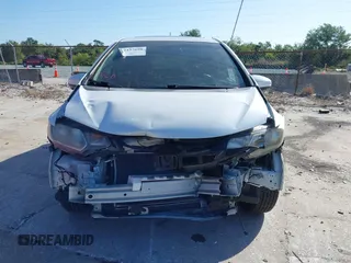 2017 Honda Fit EX-L z VIN JHMGK5H84HS013316, wystawiony jako IAAI lot #42157698 z przebiegiem 67 104 mil mil oraz . Historia ofert i sprzedaży dostępna na DreamBid. Obrazek 13.