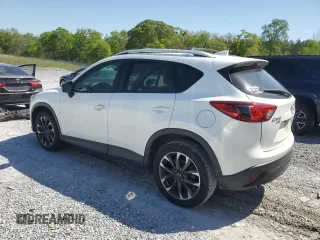 2016 Mazda CX-5 Grand Touring with VIN JM3KE4DY0G0819528, listed as a Copart auction lot 52343885 with 77,340 mi miles and Clean Title. Bid and sale history available at DreamBid. Image 2.