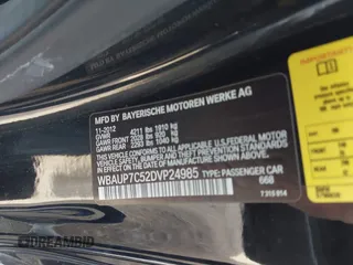 2013 BMW 1 Series 128i with VIN WBAUP7C52DVP24985, listed as a IAAI auction lot 41368682 with 107,294 mi miles and . Bid and sale history available at carsss.com. Image 9.