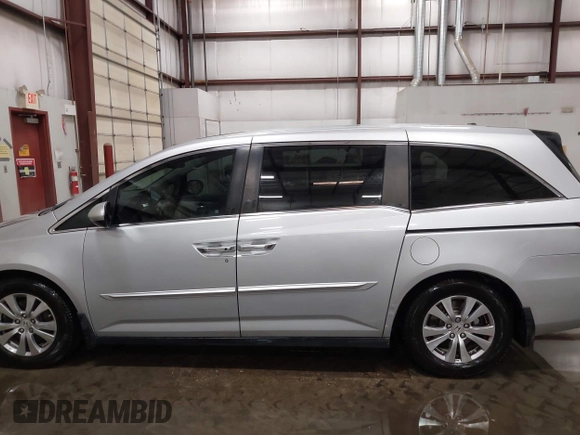 2015 Honda Odyssey EX-L with VIN 5FNRL5H66FB028822, listed as a IAAI auction lot 42067242 with 122,354 mi miles and . Bid and sale history available at carsss.com. Image 14.