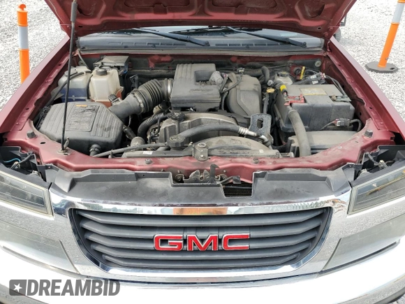 2010 GMC Canyon SLE1 with VIN 1GTJTCDE4A8143006, listed as a Copart auction lot 60853175 with 148,457 mi miles and Salvage title. Bid and sale history available at DreamBid. Image 11.