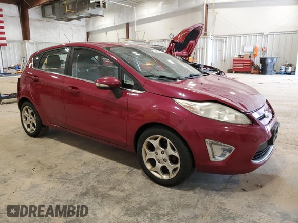 2011 Ford Fiesta SES with VIN 3FADP4FJ7BM176005, listed as a Copart auction lot 50411095 with 124,007 mi miles and Non Repairable. Bid and sale history available at carsss.com. Image 4.