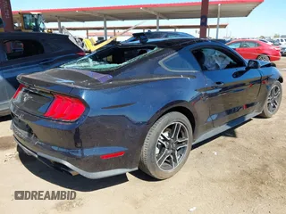 2021 Ford Mustang EcoBoost with VIN 1FA6P8TH2M5104154, listed as a IAAI auction lot 41869810 with 15,561 mi miles and . Bid and sale history available at DreamBid. Image 4.