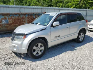 2011 Suzuki Grand Vitara Premium with VIN JS3TD0D29B4103041, listed as a Copart auction lot 62066985 with 219,727 mi miles and Salvage title. Bid and sale history available at DreamBid. Image 1.