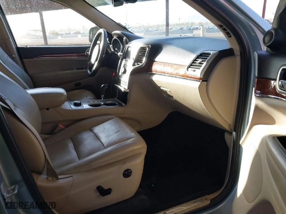 2012 Jeep Grand Cherokee Limited with VIN 1C4RJFBG2CC317363, listed as a IAAI auction lot 41689903 with 158,020 mi miles. Bid and sale history available at carsss.com. Image 5.