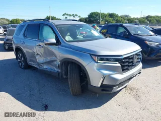 2025 Honda Pilot Touring with VIN 5FNYG2H76SB000746, listed as a IAAI auction lot 41046077 with 5,694 mi miles. Bid and sale history available at carsss.com. Image 1.