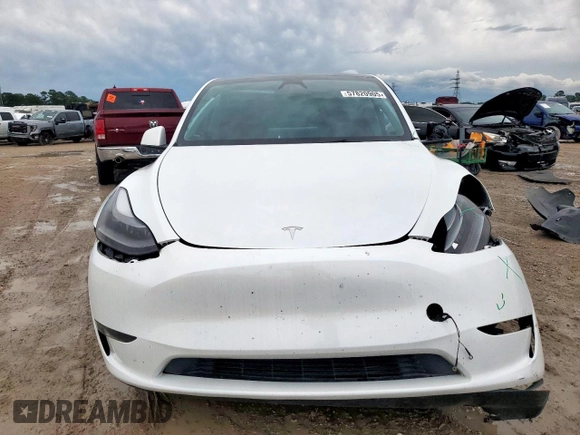 2024 Tesla Model Y Performance z VIN 7SAYGDEF0RA266605, wystawiony jako Copart lot #57820905 z przebiegiem Nie podano mil oraz Szkoda całkowita • Salvage title. Historia ofert i sprzedaży dostępna na DreamBid. Obrazek 5.