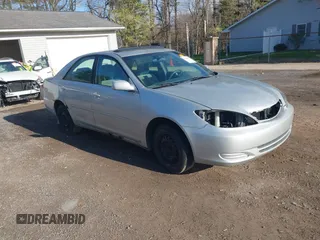 2004 Toyota Camry LE with VIN 4T1BE32K64U282875, listed as a IAAI auction lot 42038006 with 238,605 mi miles. Bid and sale history available at carsss.com. Image 1.