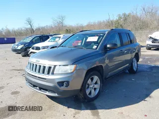 2011 Jeep Compass with VIN 1J4NT1FA6BD290625, listed as a IAAI auction lot 41758224 with 53,254 mi miles. Bid and sale history available at carsss.com. Image 2.