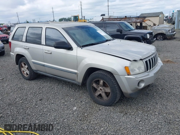 2007 Jeep Grand Cherokee Laredo z VIN 1J8GR48K57C605912, wystawiony jako IAAI lot #42323050 z przebiegiem 210 615 mil mil oraz . Historia ofert i sprzedaży dostępna na DreamBid. Obrazek 1.