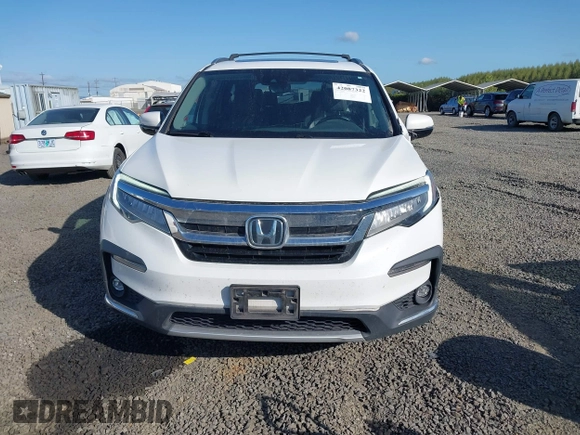 2021 Honda Pilot Touring 8-Passenger with VIN 5FNYF6H92MB031782, listed as a IAAI auction lot 42087322 with 70,062 mi miles and . Bid and sale history available at DreamBid. Image 12.