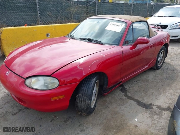 1999 Mazda MX-5 Miata with VIN JM1NB3532X0113205, listed as a IAAI auction lot 41981635 with 111,544 mi miles. Bid and sale history available at carsss.com. Image 2.