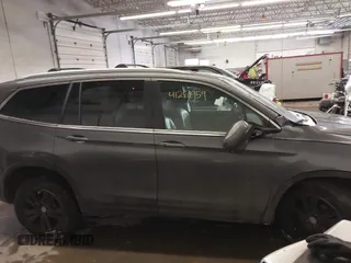 2016 Honda Pilot EX-L with VIN 5FNYF6H75GB104064, listed as a IAAI auction lot 41286959 with 106,263 mi miles. Bid and sale history available at carsss.com. Image 14.