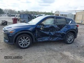2021 Mazda CX-5 Grand Touring with VIN JM3KFBDM8M0484383, listed as a IAAI auction lot 41800786 with 58,617 mi miles. Bid and sale history available at carsss.com. Image 14.