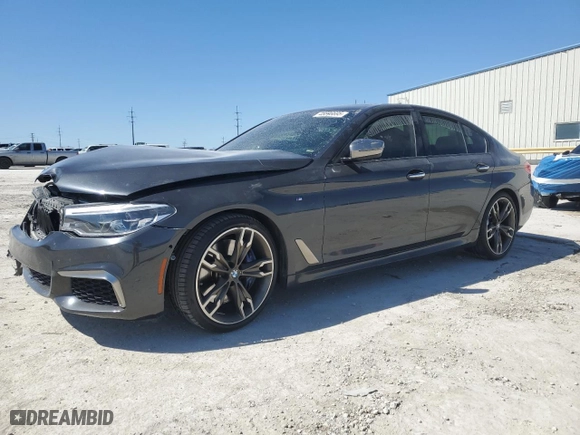 2018 BMW 5 Series M550i xDrive with VIN WBAJB9C5XJB049624, listed as a Copart auction lot 48846695 with 0 mi miles and Salvage Title. Bid and sale history available at carsss.com. Image 1.