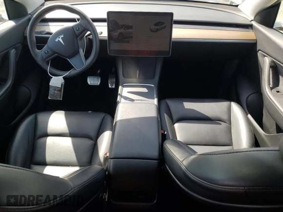 2022 Tesla Model Y Long Range z VIN 7SAYGAEE6NF492070, wystawiony jako Copart lot #52032415 z przebiegiem 143 732 mil mil oraz Szkody całkowita. Historia ofert i sprzedaży dostępna na DreamBid. Obrazek 8.