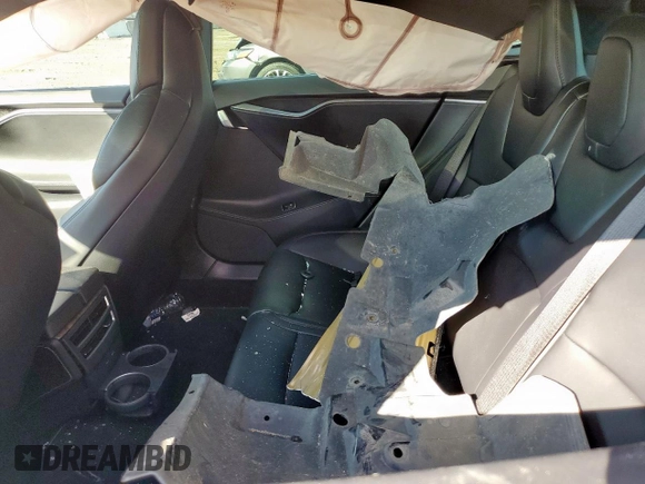 2019 Tesla Model S 100D z VIN 5YJSA1E47KF341410, wystawiony jako Copart lot #58707445 z przebiegiem Nie podano mil oraz Szkoda całkowita • Salvage title. Historia ofert i sprzedaży dostępna na DreamBid. Obrazek 10.