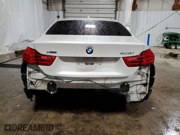 2014 BMW 4 Series 428i xDrive z VIN WBA3N9C53EK245720, wystawiony jako Copart lot #45166125 z przebiegiem 154 318 mil mil oraz Szkoda całkowita • Salvage title. Historia ofert i sprzedaży dostępna na DreamBid. Obrazek 6.