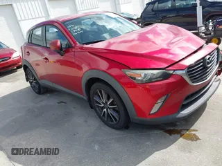 2018 Mazda CX-3 Touring with VIN JM1DKDC7XJ0318219, listed as a IAAI auction lot 41941104 with 86,186 mi miles. Bid and sale history available at carsss.com. Image 1.