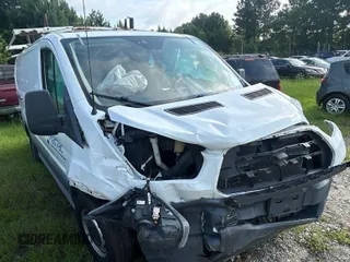 2017 Ford Transit z VIN 1FTYE1YMXHKA68114, wystawiony jako IAAI lot #42742955 z przebiegiem 245 470 mil mil oraz . Historia ofert i sprzedaży dostępna na DreamBid. Obrazek 34.