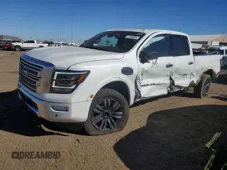 2021 Nissan Titan XD SV with VIN 1N6AA1FB0MN517885, listed as a Copart auction lot 77046004 with 52,284 mi miles and Salvage Title. Bid and sale history available at carsss.com. Image 1.