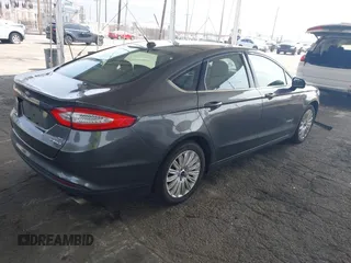 2015 Ford Fusion SE Hybrid with VIN 3FA6P0LU6FR309099, listed as a IAAI auction lot 42497429 with 157,631 mi miles and . Bid and sale history available at DreamBid. Image 4.
