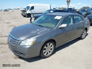 2005 Toyota Avalon XL with VIN 4T1BK36B75U041637, listed as a IAAI auction lot 41967868 with 157,582 mi miles. Bid and sale history available at carsss.com. Image 2.