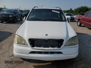 2000 Mercedes-Benz M-Class with VIN 4JGAB72E8YA200237, listed as a Copart auction lot 65765134 with 194,399 mi miles and Clean Title. Bid and sale history available at carsss.com. Image 5.