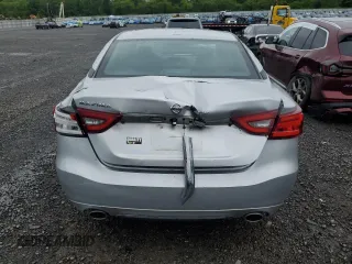 2016 Nissan Maxima SV z VIN 1N4AA6AP1GC431011, wystawiony jako Copart lot #56824955 z przebiegiem 103 668 mil mil oraz Szkoda całkowita • Salvage title. Historia ofert i sprzedaży dostępna na DreamBid. Obrazek 6.