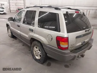 2003 Jeep Grand Cherokee Laredo with VIN 1J4GW48SX3C544237, listed as a IAAI auction lot 40823228 with 1 mi miles. Bid and sale history available at carsss.com. Image 3.