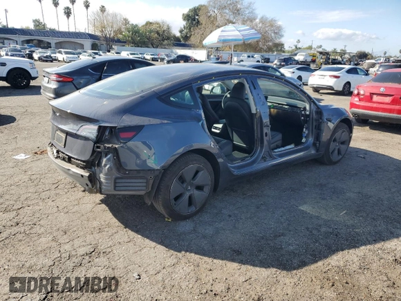 2023 Tesla Model 3 with VIN 5YJ3E1EA3PF541593, listed as a Copart auction lot 43926455 with 26,593 mi miles and Salvage title. Bid and sale history available at DreamBid. Image 3.