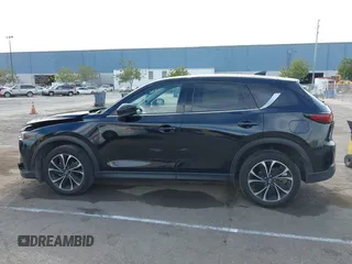 2023 Mazda CX-5 2.5 S Premium Package with VIN JM3KFBDM4P0266378, listed as a IAAI auction lot 41655712 with 31,746 mi miles. Bid and sale history available at carsss.com. Image 14.