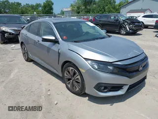 2016 Honda Civic EX-L with VIN 19XFC1F7XGE024304, listed as a IAAI auction lot 42711660 with 131,204 mi miles and . Bid and sale history available at DreamBid. Image 1.