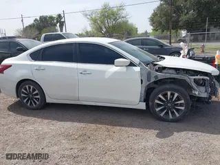 2018 Nissan Altima 2.5 SR with VIN 1N4AL3AP1JC283393, listed as a IAAI auction lot 41701104 with 142,917 mi miles. Bid and sale history available at carsss.com. Image 14.