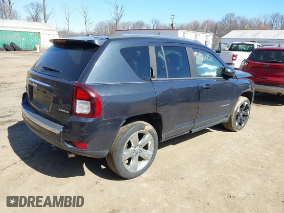 2014 Jeep Compass Limited with VIN 1C4NJDCB5ED700913, listed as a IAAI auction lot 41821956 with 175,312 mi miles. Bid and sale history available at carsss.com. Image 4.