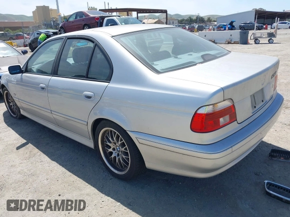 2001 BMW 5 Series 530iA with VIN WBADT63411CF01165, listed as a IAAI auction lot 42101589 with 151,243 mi miles. Bid and sale history available at carsss.com. Image 3.