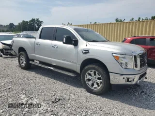 2016 Nissan Titan XD Platinum Reserve with VIN 1N6BA1F45GN514023, listed as a Copart auction lot 68817774 with 207,822 mi miles and Salvage Title. Bid and sale history available at carsss.com. Image 4.