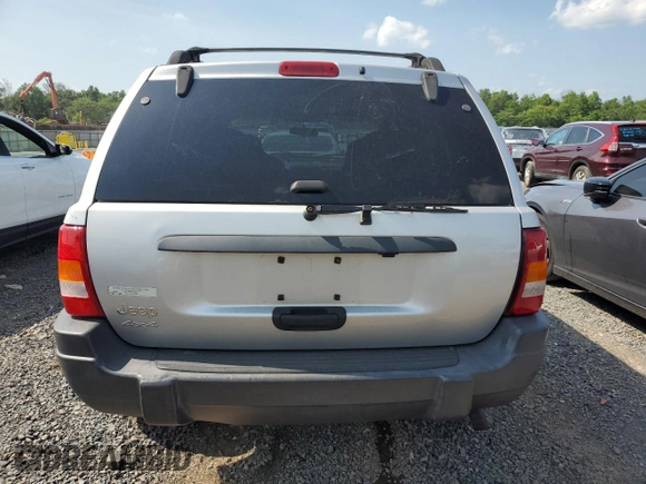 2004 Jeep Grand Cherokee Laredo with VIN 1J4GW48S44C282992, listed as a Copart auction lot 61523685 with 112,486 mi miles and Clean title. Bid and sale history available at DreamBid. Image 6.