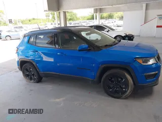 2020 Jeep Compass Altitude with VIN 3C4NJCBB3LT257440, listed as a IAAI auction lot 42115129 with 70,990 mi miles and . Bid and sale history available at carsss.com. Image 13.