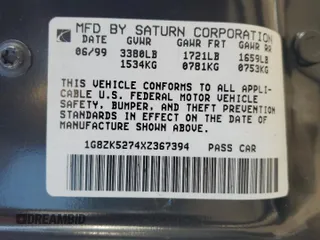 1999 Saturn SL with VIN 1G8ZK5274XZ367394, listed as a Copart auction lot 63863795 with 73,197 mi miles and Salvage title. Bid and sale history available at DreamBid. Image 12.